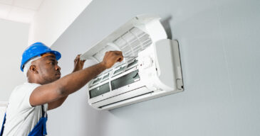 Happy,Young,African,Male,Technician,Repairing,Air,Conditioner Happy,Young,African,Male,Technician,Repairing,Air,Conditioner